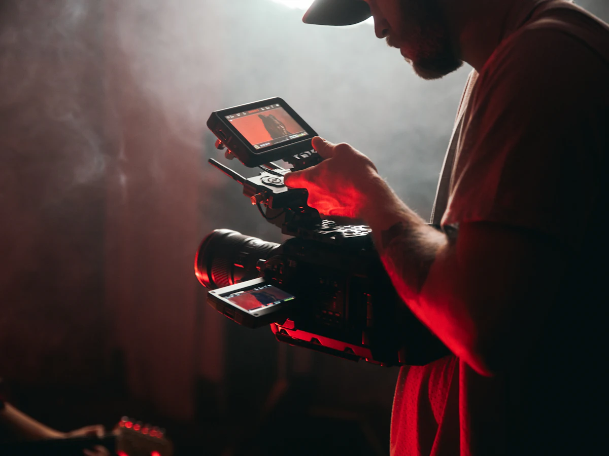 Videographer filming with a professional camera